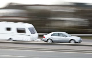 Car towing a caravan